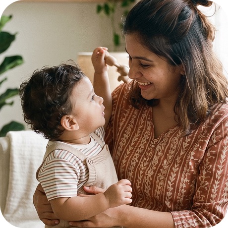 A mother playing with her young son at home